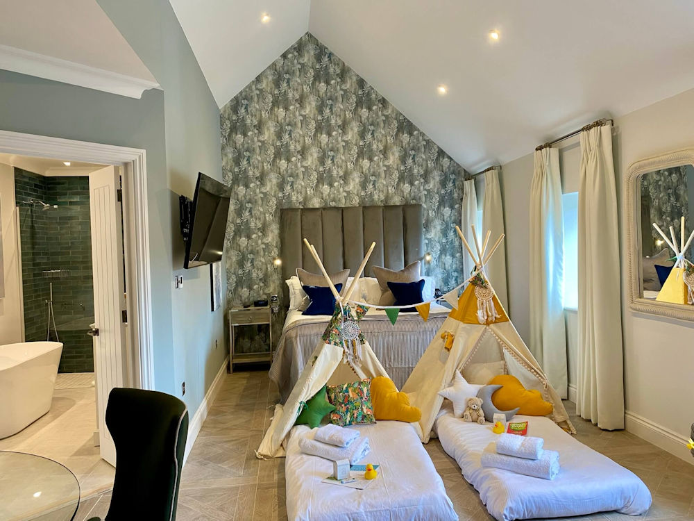 Great Fosters bedroom with tee pees